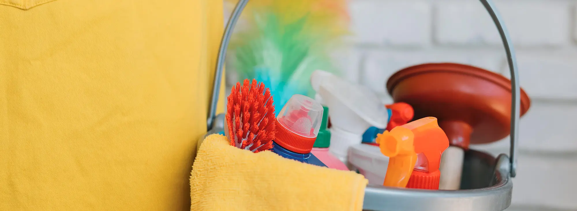 Image of a gloved hand cleaning surface.